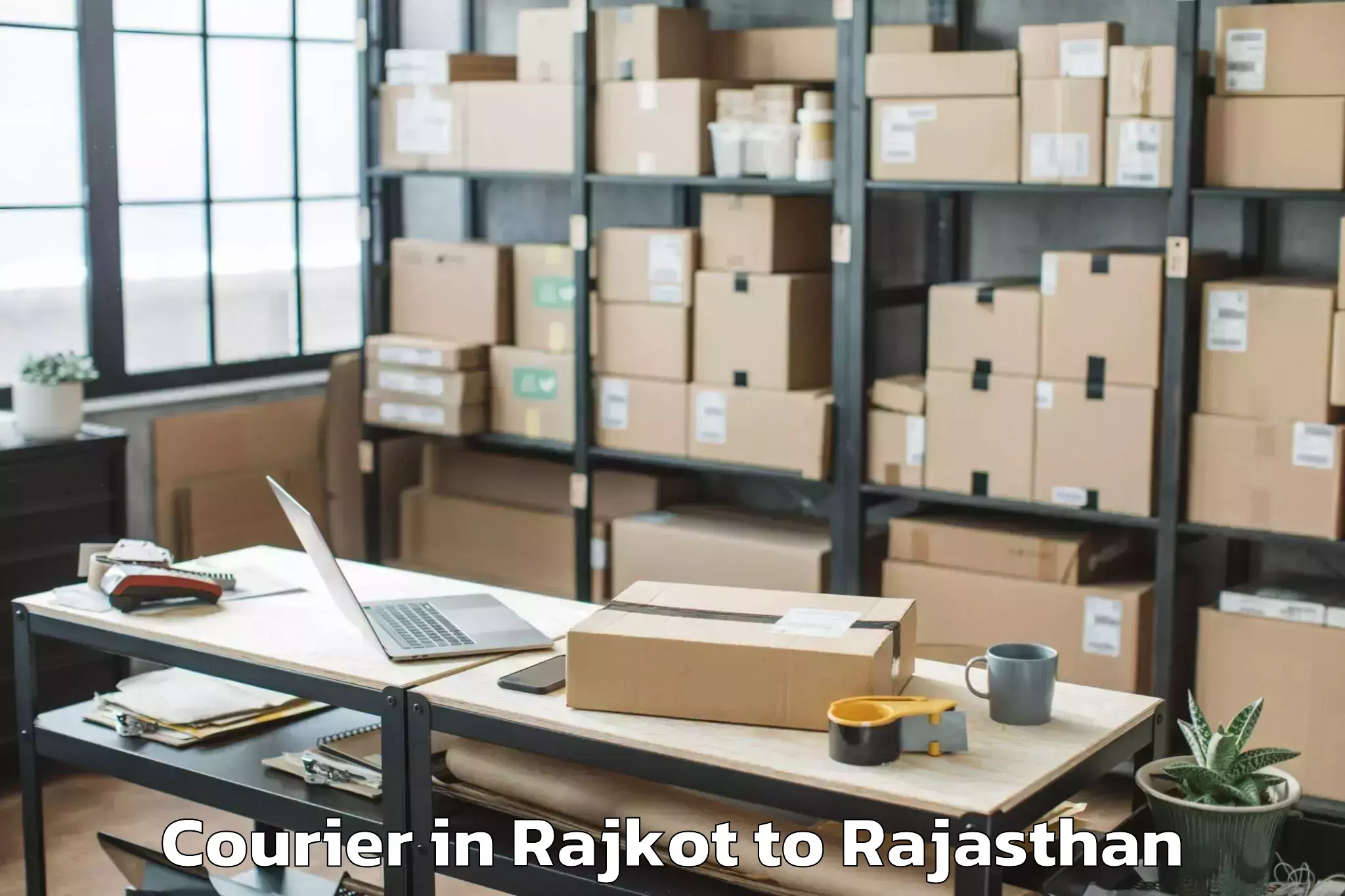 Professional Rajkot to Chomu Courier